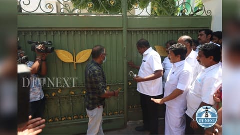 Revenue Department officials reopening the AIADMK headquarters