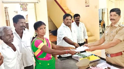 Panankatteri ward 8 contestant Vijaya petitions police over her family being ostracised in Ambur on Tuesday