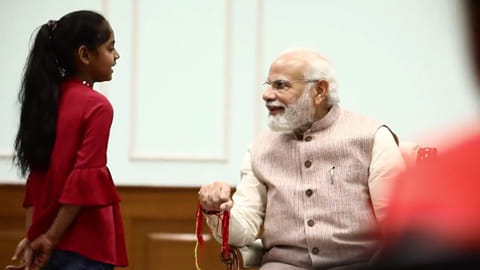 Daughter of PMO staff with PM Modi