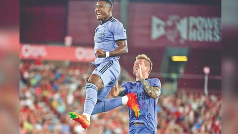 David Alaba (left) celebrates
after scoring the winning goal.
