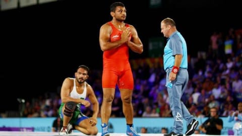 India's Deepak Punia and Pakistan's Muhammad Inam react during the final