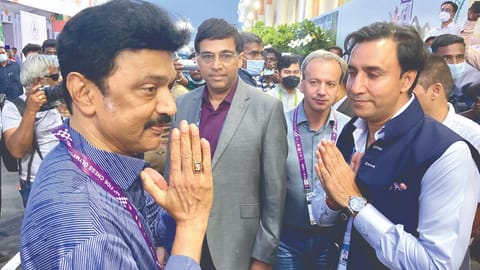 Cheif Minister MK Stalin (left) greets AICF president Sanjay Kapoor at the Chess Olympiad venue in Mahabalipuram on Sunday. Behind the duo is Viswanathan Anand.