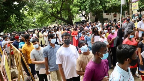 Students standing in queue at a centre in Nungambakkam