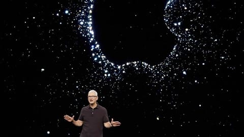 Apple CEO Tim Cook speaks at an Apple event on the campus of Apple's headquarters in Cupertino.