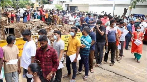 Candidates standing in queue at an exam centre in Nungambakkam.