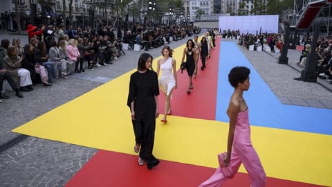 Models wearing creations for the Stella McCartney ready-to-wear Spring/Summer 2023 fashion collection presented Monday.
