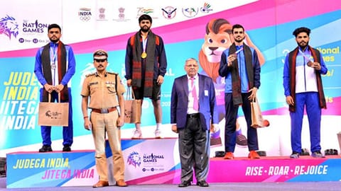 Sai Praneeth (2nd from left) after winning gold