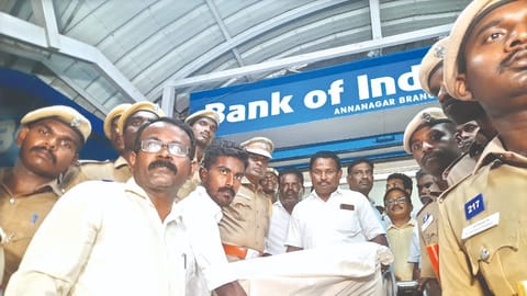 Madurai DRO receives the gold armour for Thevar jayanthi from the bank in Madurai on Wednesday.