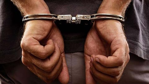 Man arrested for harassing college student