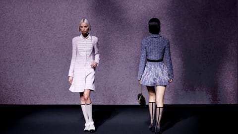 Models present creations by designer Virginie Viard as part of her Spring-Summer 2023 Women's ready-to-wear collection show for fashion house Chanel, during Paris Fashion Week in Paris