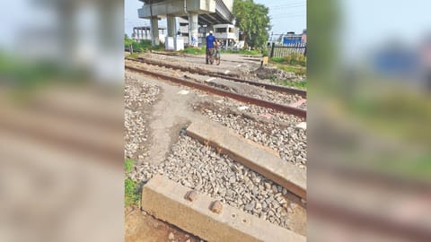 Damaged level crossing at Putlur station.