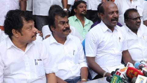Ma Subramanian addressing the press after distributing mosquito nets in Saidapet
