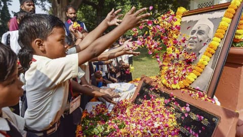School students pay tribute to India's first prime minister Jawaharlal Nehru on his birth anniversary