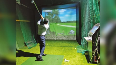 Golfer playing a shot on the course chosen by him