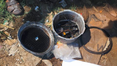 A cooker fitted with detonator, wires and batteries found during investigation
