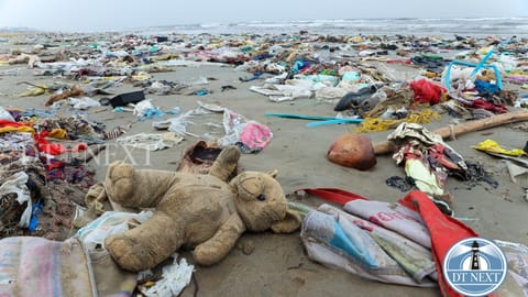 Plastic and other debris are seen on the shores of Marina Beach