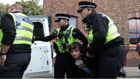 Police detain man after eggs thrown at King Charles