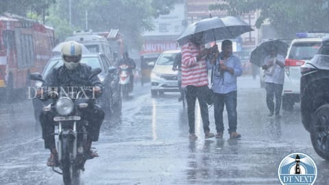 People travelling in the middle of heavy rains