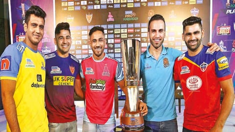 Tamil Thalaivas defender Sahil Gulia, Dabang Delhi captain Naveen Kumar, Jaipur Pink Panthers skipper Sunil Kumar, Puneri Paltan captain Fazel Atrachali and UP Yoddhas skipper Pardeep Narwal with the Pro Kabaddi League trophy