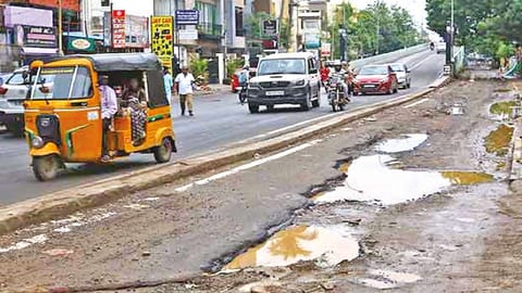 A main road damaged due to the monsoon rains