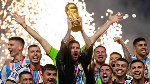 Argentina's Lionel Messi lifts the trophy after winning the World Cup final