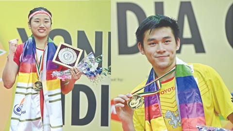 Champions An Seyoung and  Kunlavut Vitidsarn.