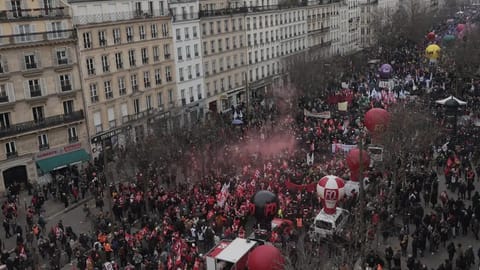 People gather near Place de la Republique during a demonstration