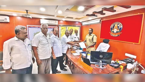 Vellore Lorry Owners Association members submitting a petition to SP S Rajesh Kannan on Monday.