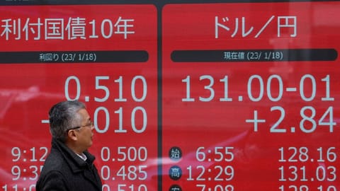 monitors displaying Japan's 10-year government bond yield on glits