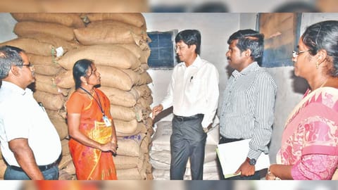 Additional Chief Secretary Dr J Radhakrishnan in a godown at Tiruchy on Saturday