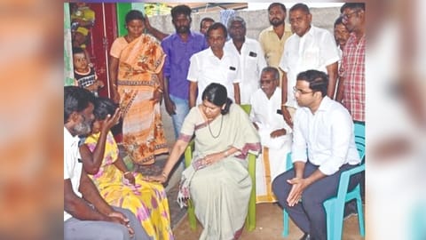 Thoothukudi MP Kanimozhi consoles the bereaved family of a student, who died last month in a fall, near Tiruchendur on Sunday