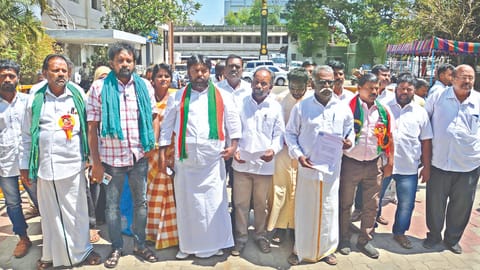 Members of Tamil National Federation after petitioning the Returning Officer in Erode on Thursday