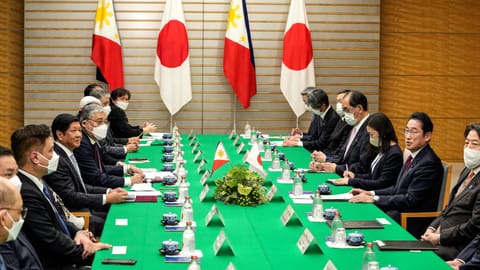 Philippine President Ferdinand Marcos Jr. (3-L) and Japanese Prime Minister Fumio Kishida (2-R) talk at prime minister?s official residence in Tokyo