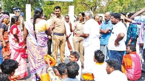 Relatives of the deceased boy arguing with police