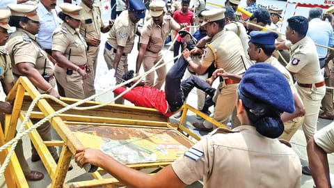 Police personnel stopping a student
union member from entering the DIG office in Thanjavur on Wednesday