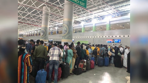 Indians evacuated from Sudan board a flight in Jeddah on Sunday