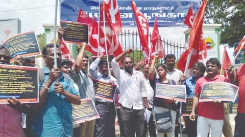 CPM members staging a demo nea May Day Park in Chennai on  Monday
