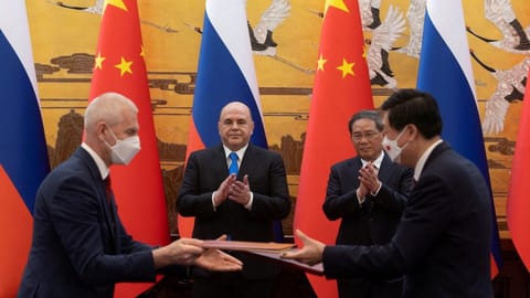 Russia, China seal economic pacts amid Western criticism