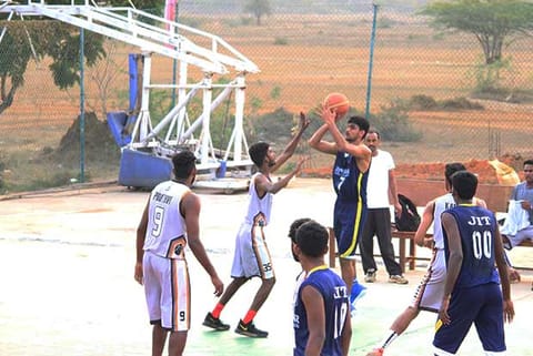 India player Muin Bek in action against MLR Hyderabad in the All-India basketball tournament
