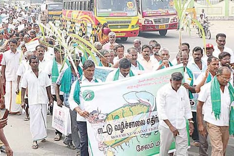 A large number of farmers take out a protest march against the Salem-Chennai corridor on Wednesday