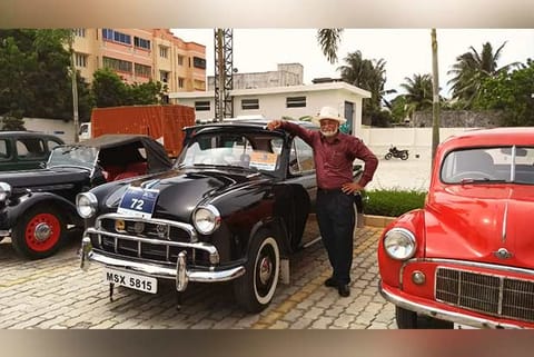 Naresh Bangara stands with his 1959 Mark-I Ambassador car