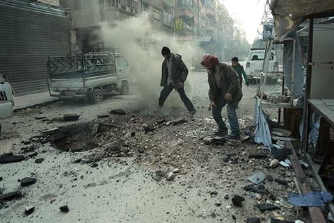 Syria army cuts off main rebel town in Ghouta as death toll tops 1,000