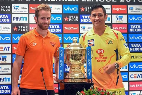 SRH captain Kane Williamson and CSK captain Mahendra Singh Dhoni poses with IPL cricket T20 trophy