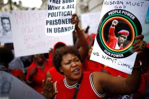 Protesters demonstrate against Ugandan President Yoweri Museveni outside Uganda House in London