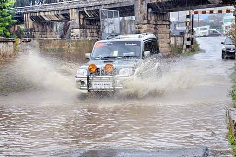 The flooded Ooty Boat House Road in The Nilgiris following heavy rains