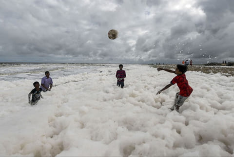 NGT takes cognisance of news reports showing foam at Marina beach, seeks report