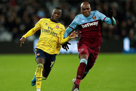 Arsenal forward Nicolas Pepe (left) scored a goal and set up another