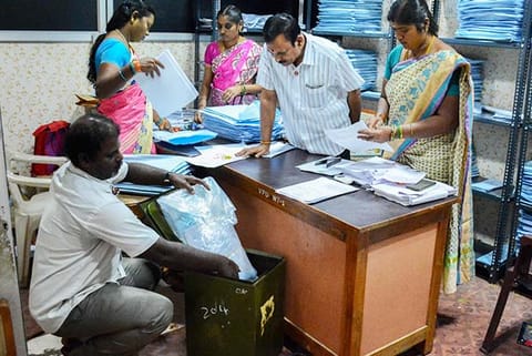 Officials arranging the election materials for the second phase of polling, at Ambattur panchayat office