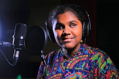 Jyothi during a song recording
