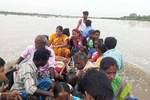 People being ferried from Mela Ramanallur in Ariyalur